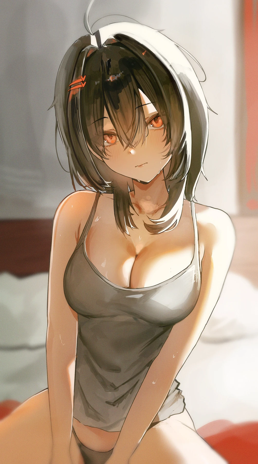 Dark-haired character in a hood, lit from above